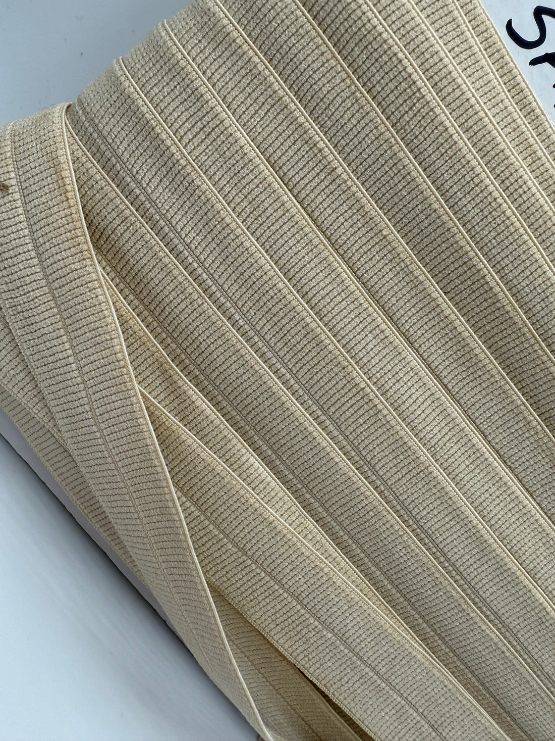 Sand - Foldeelastik 2 cm bred