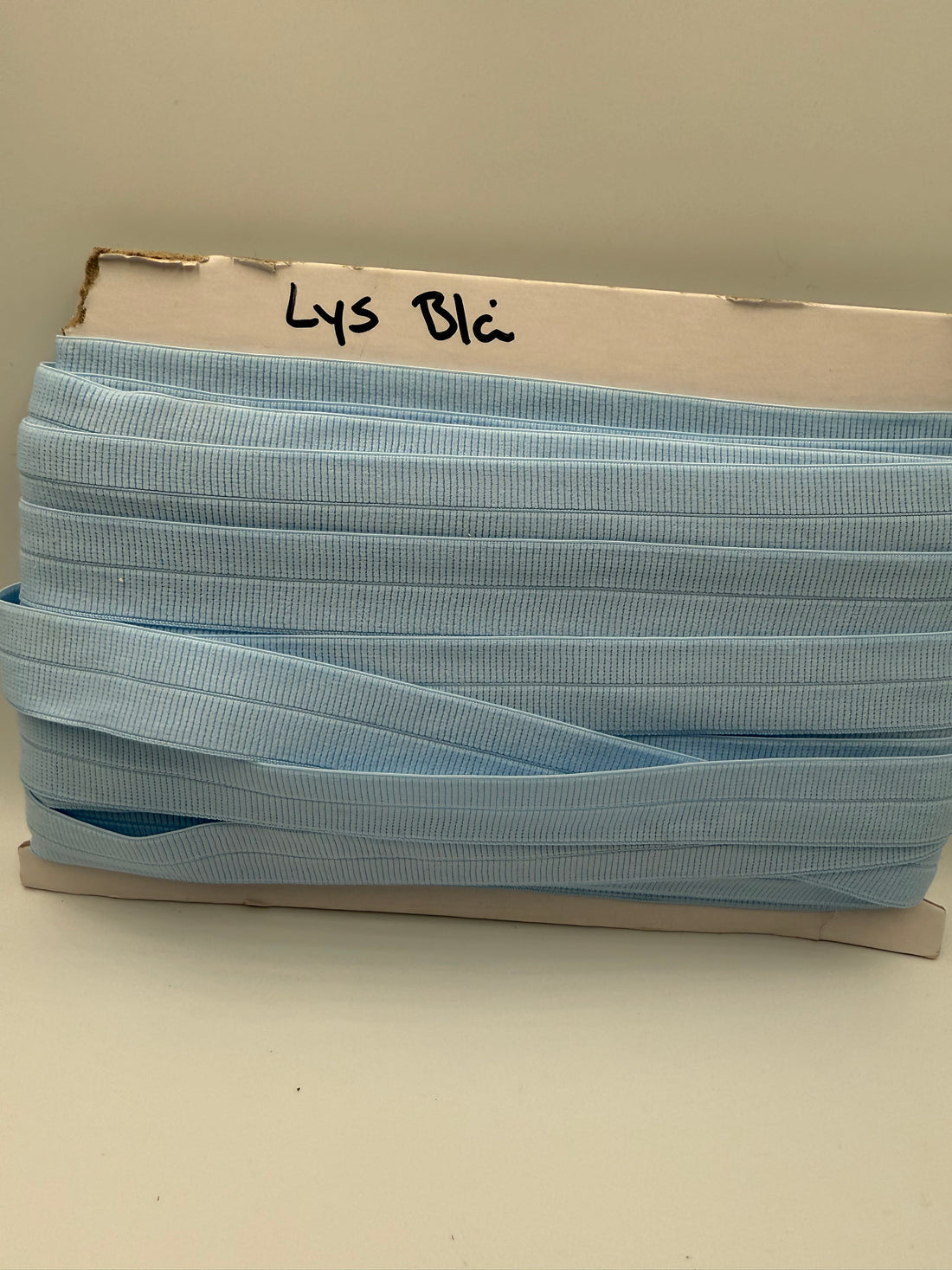 Lys blå - Foldeelastik 2 cm bred